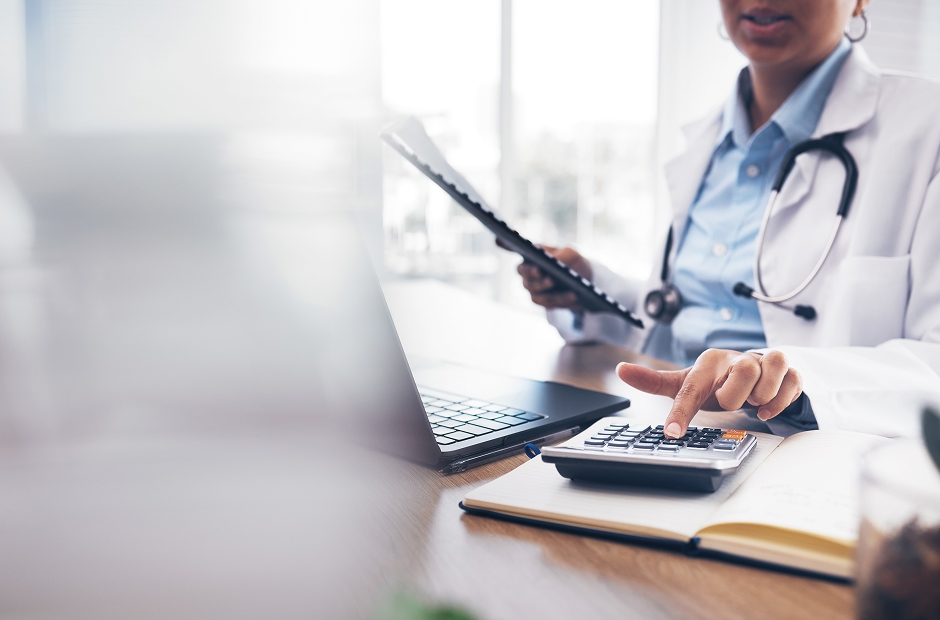 Health Care Worker Inputting Data