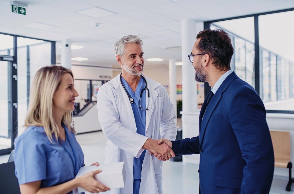 Health care professionals shaking hands