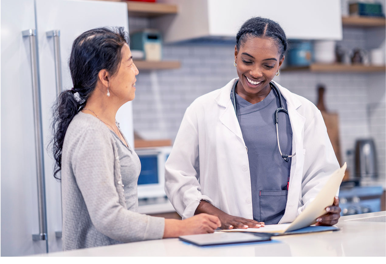 doctor and patient looking at records