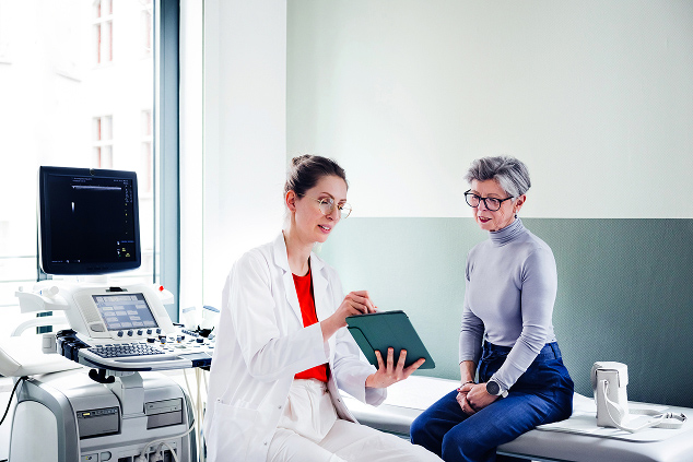 Doctor woman elderly record