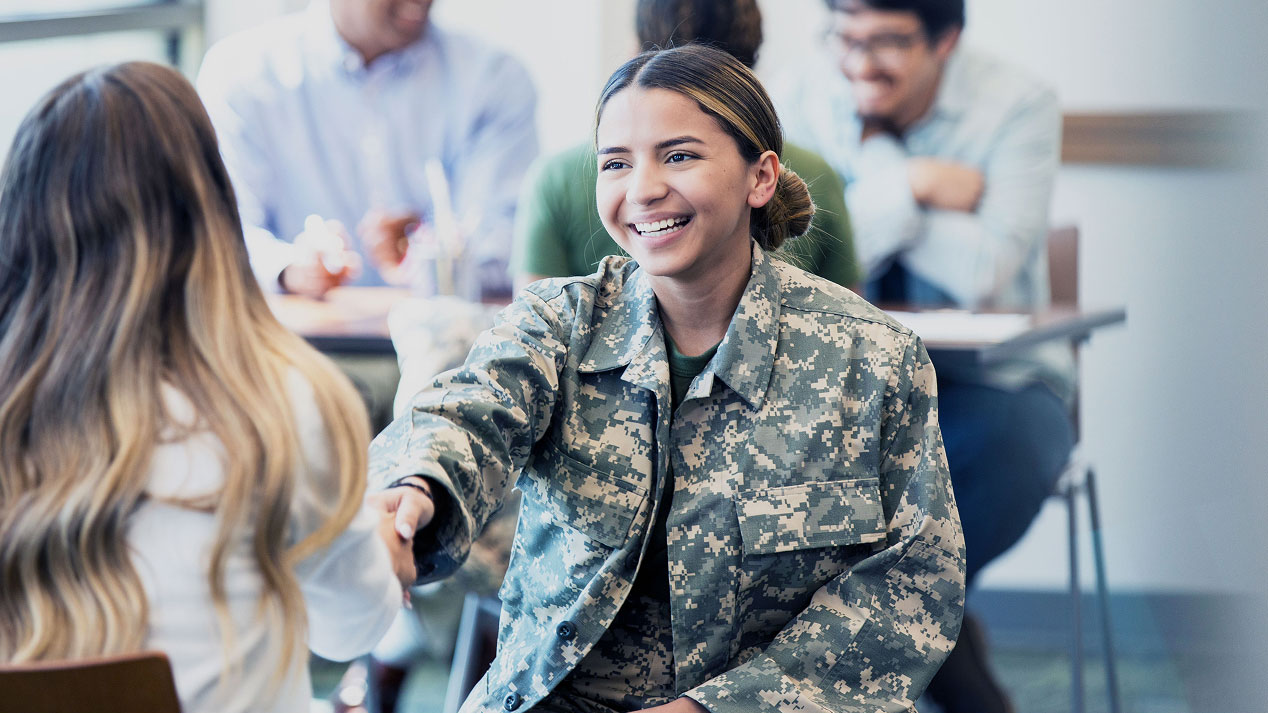 Veteran woman shaking hands