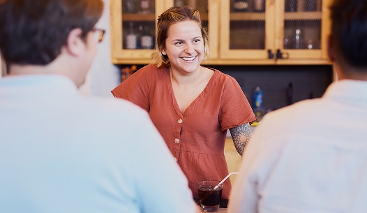 Commence employee talking with co-workers